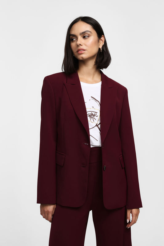 Short blazer with centered buttons