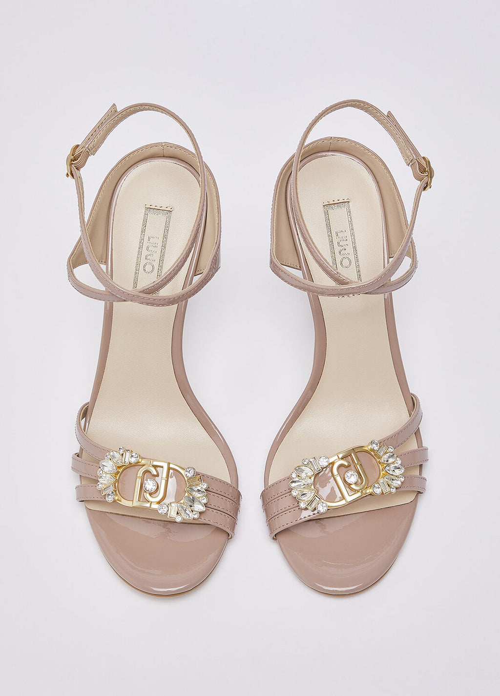 Patent leather sandals with bejewelled logo