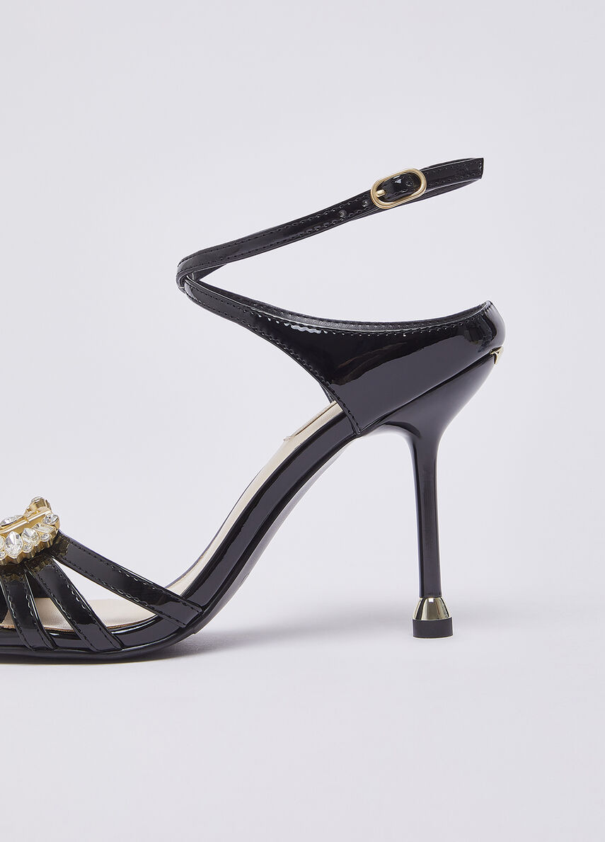 Patent leather sandals with bejewelled logo