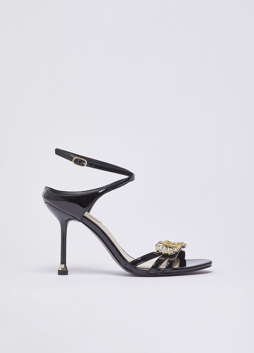 Patent leather sandals with bejewelled logo
