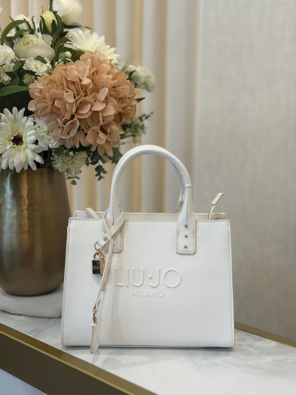 Small handbag with charm